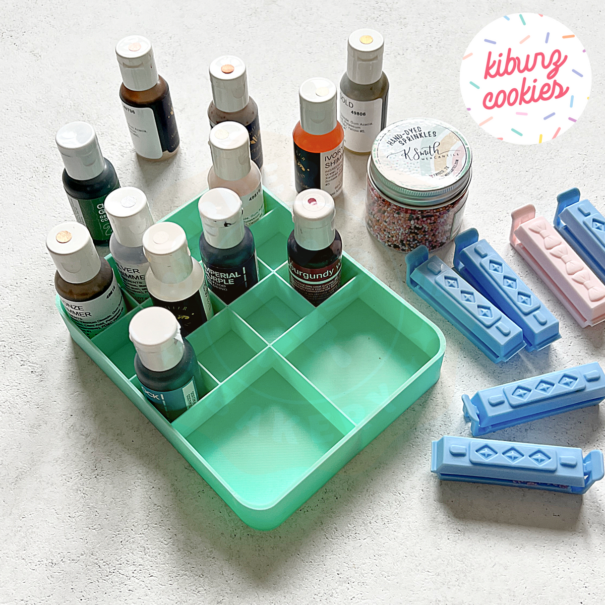 Mint green 3D printed gel color organizer with 12 wells, designed by Kiburz Cookies