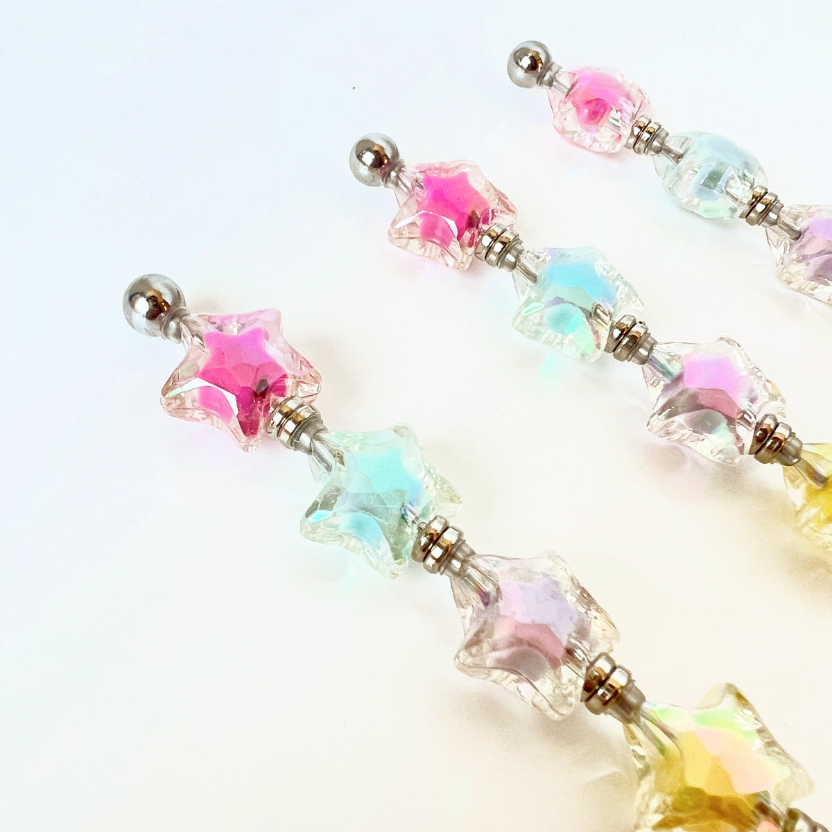 Handmade iridescent star cookie scribe with stainless steel needle