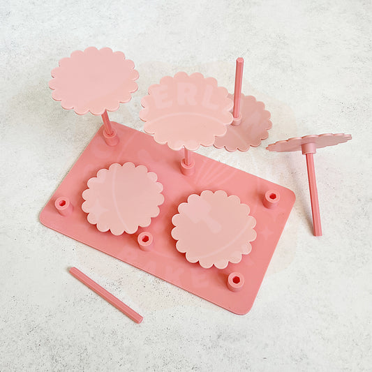 3D printed flower nail and holder set by Kiburz Cookies for piping buttercream flowers