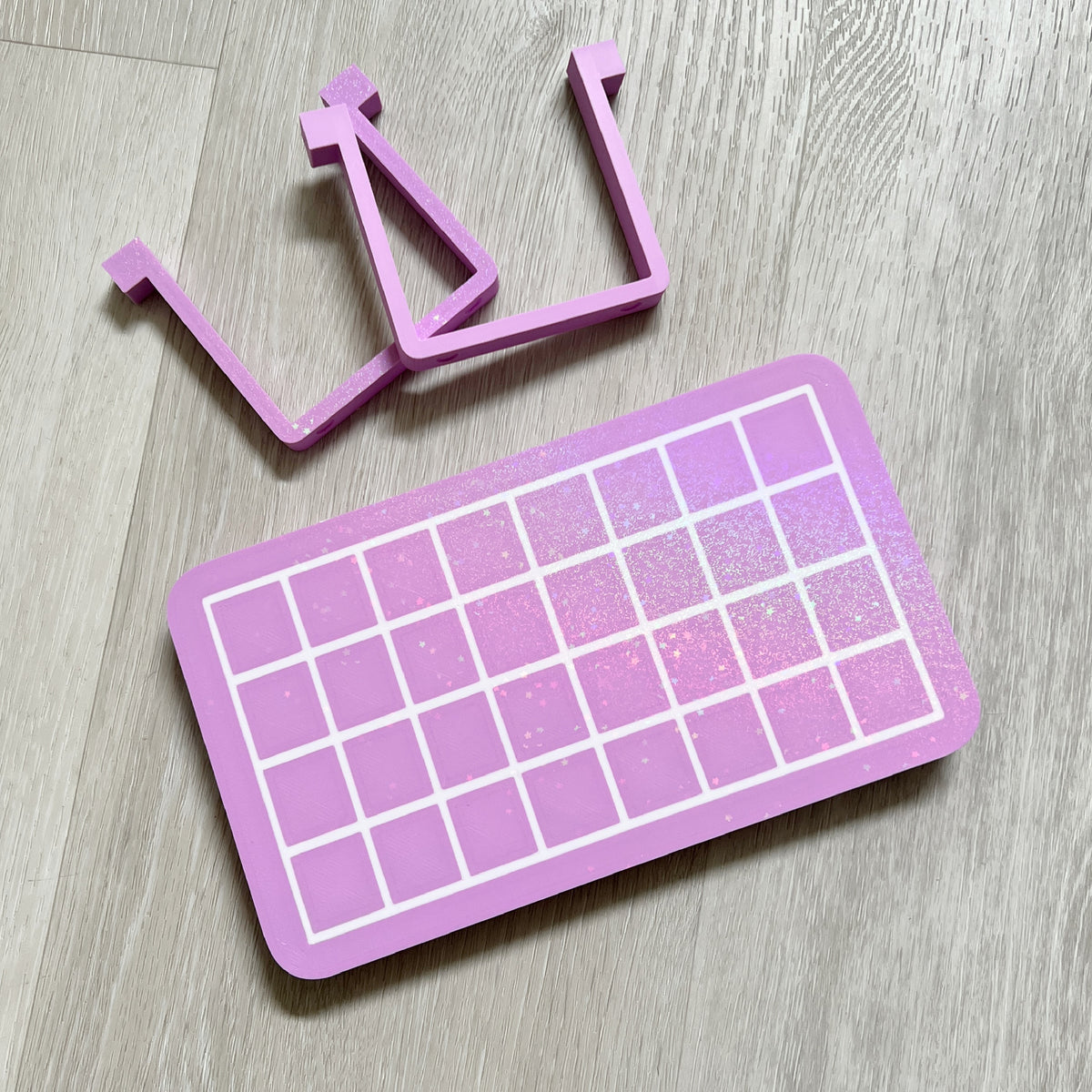 Gridded heat sealer table for cello bags, designed by Kiburz Cookies