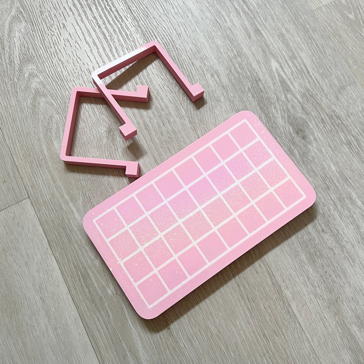 Gridded heat sealer table for cello bags, designed by Kiburz Cookies