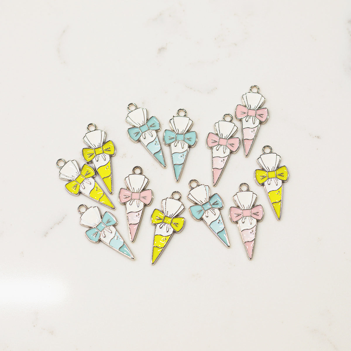 Piping bag bow enamel charm, 1.15 inches, sold as a pair