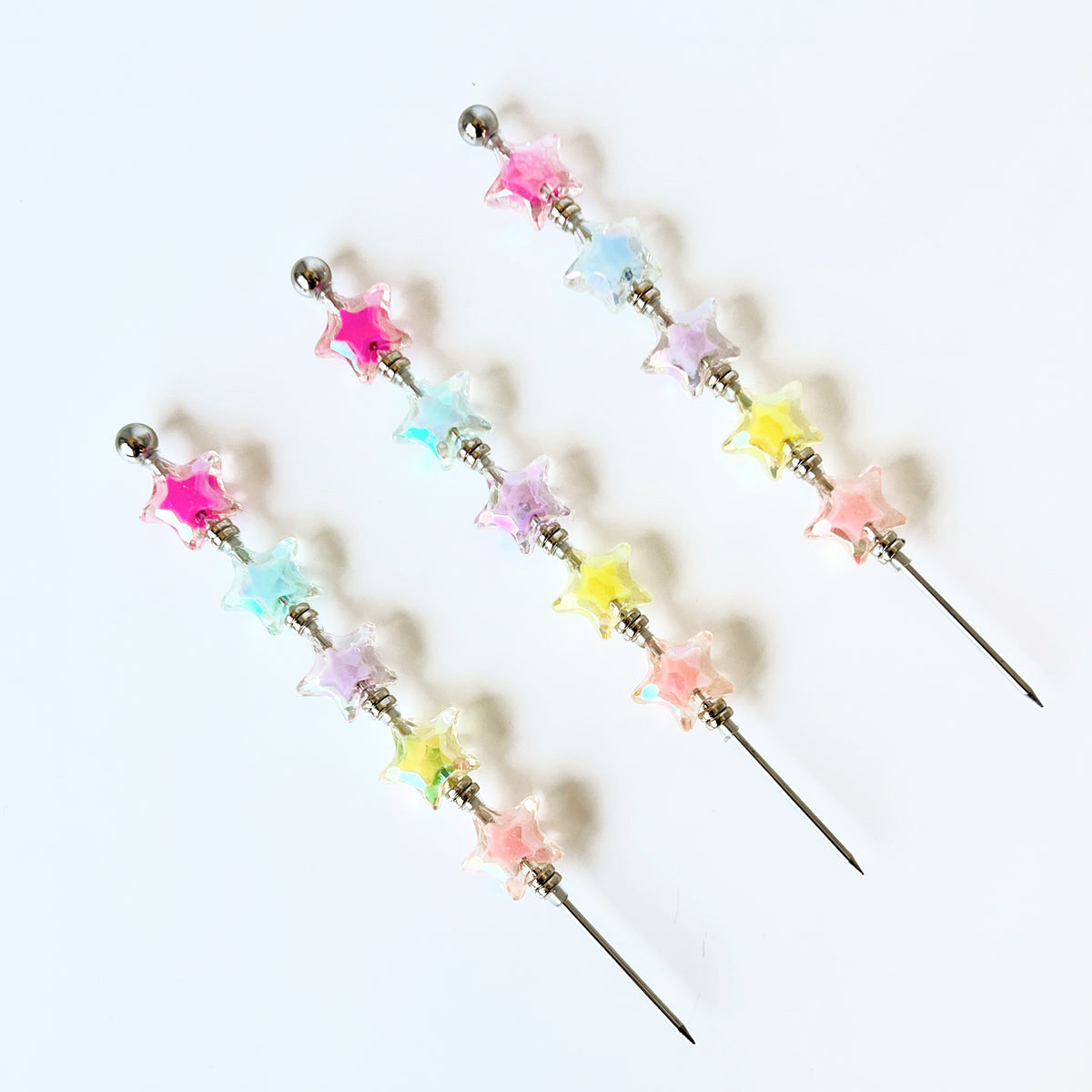 Handmade iridescent star cookie scribe with stainless steel needle