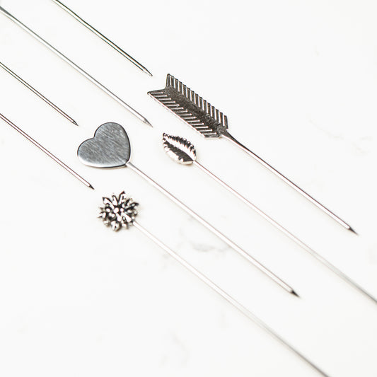 Naked stainless steel cookie scribe, snowflake and leaf needle design