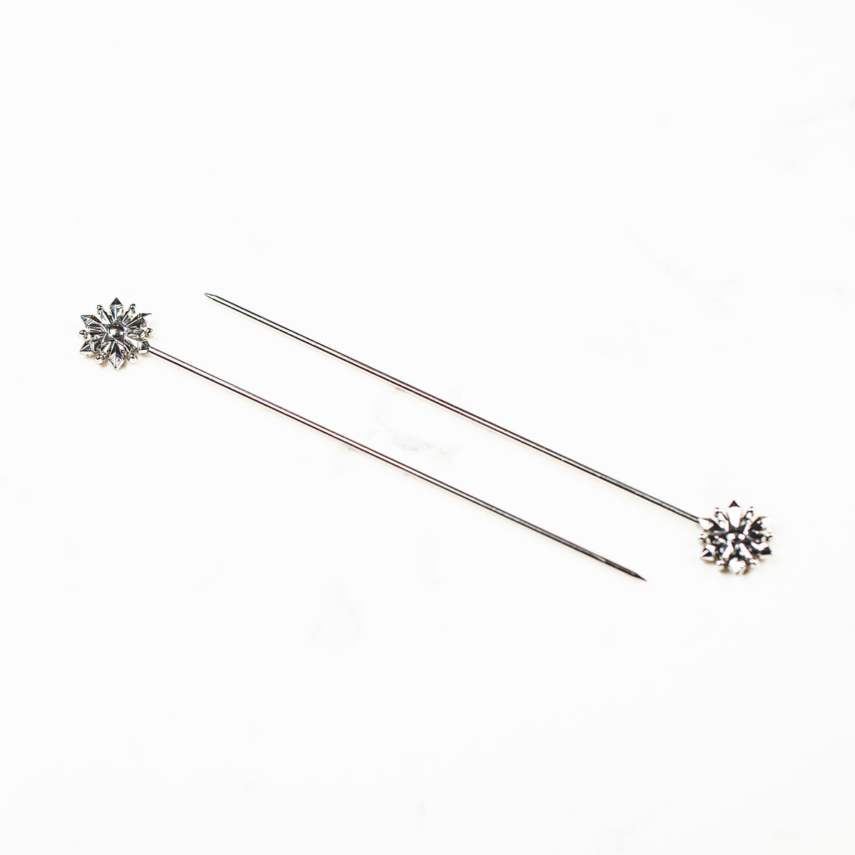 Naked stainless steel cookie scribe, snowflake and leaf needle design