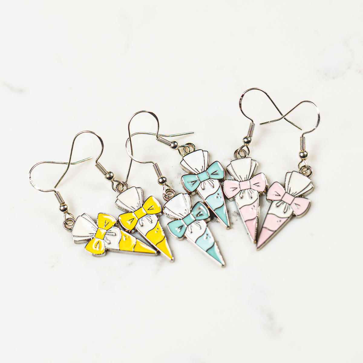 Dainty piping bag and bow clip enamel charm earrings