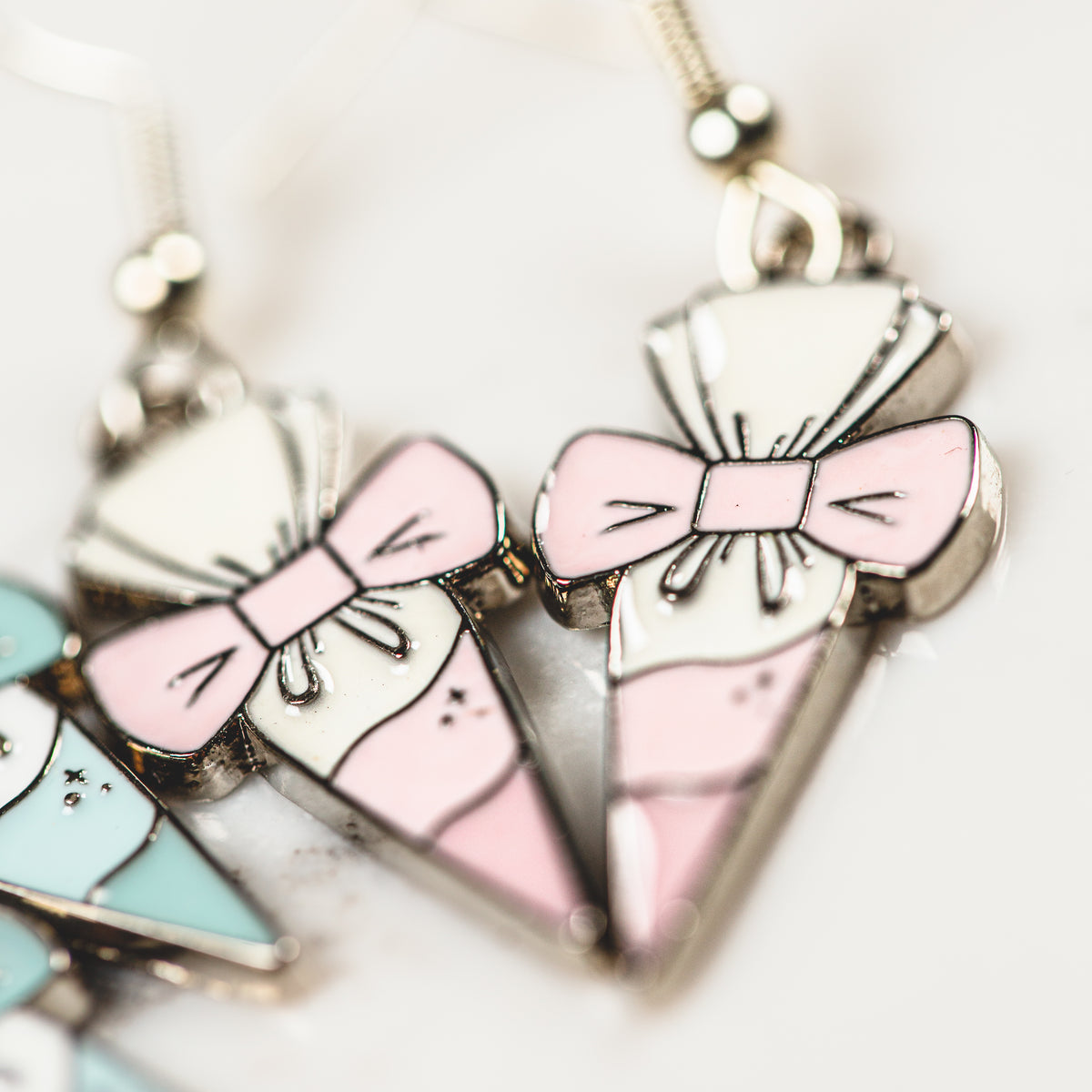 Dainty piping bag and bow clip enamel charm earrings