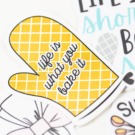 Borderlands Bakery vinyl baking stickers, piping bag and oven mitt designs
