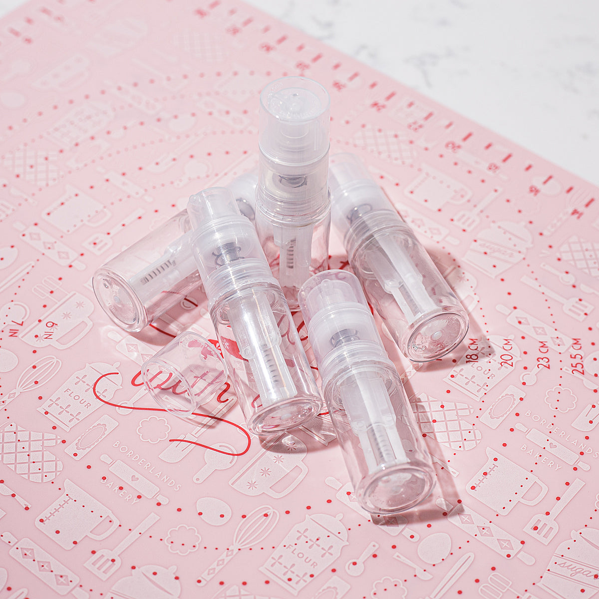 Refillable dry dust pump spray bottle for edible glitter and powder